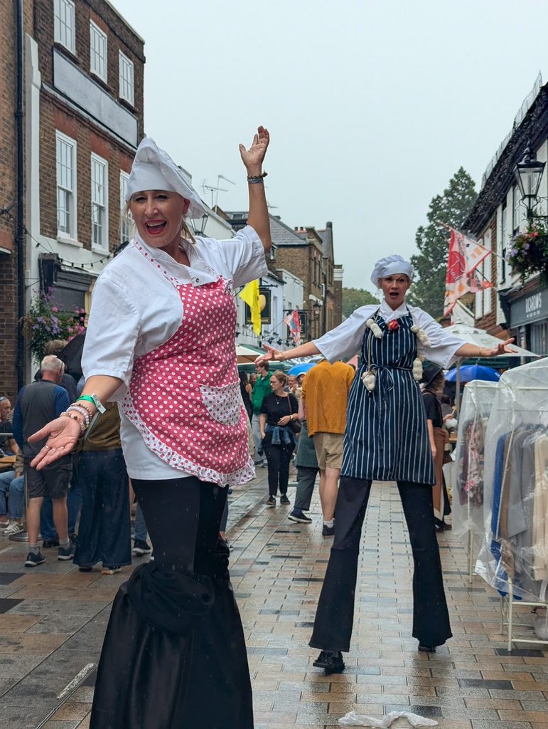 Chefs on stilts Two chefs on stilts strike a pose on Church Street where the Food Festival festivities were concentrated