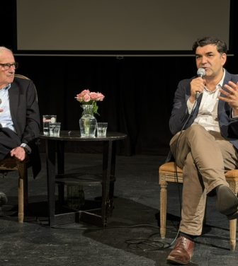 Adam Raphael and Gordon Corera on stage.