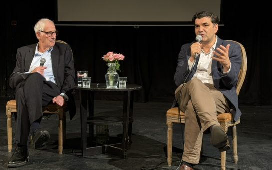 Adam Raphael and Gordon Corera on stage.