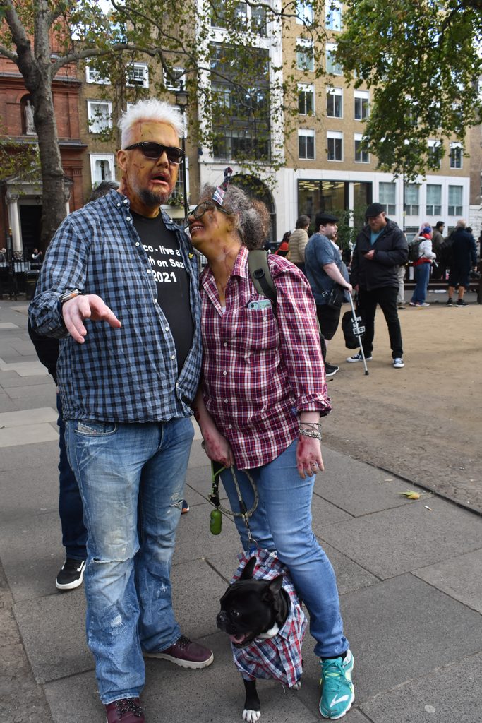 Dana and Gavin Townsend pose for a picture with their dog Monty
