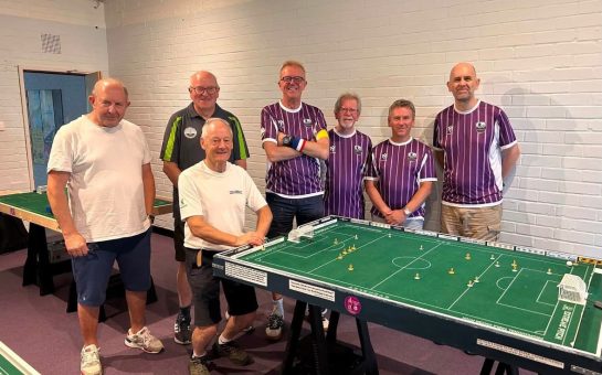 Finchampstead Subbuteo Club members, From left to right: Dave Simmill, Shaun Ellis (black shirt), Adrian Butt (white shirt), Simon Hawley, Jon Patten, Alan Cutler, David Legg.