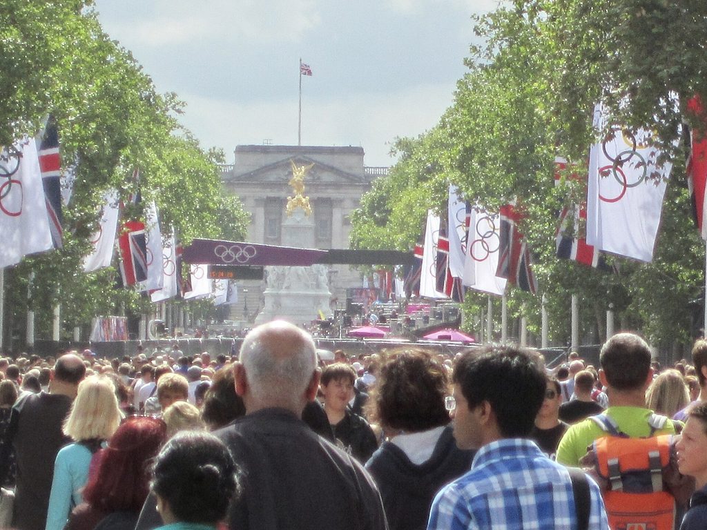An image showing various locals on Horse Parade Grounds in London as they gather for the London Olympics in 2012.