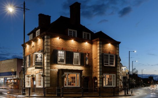 A photo of Admiral Nelson pub lit up in the night