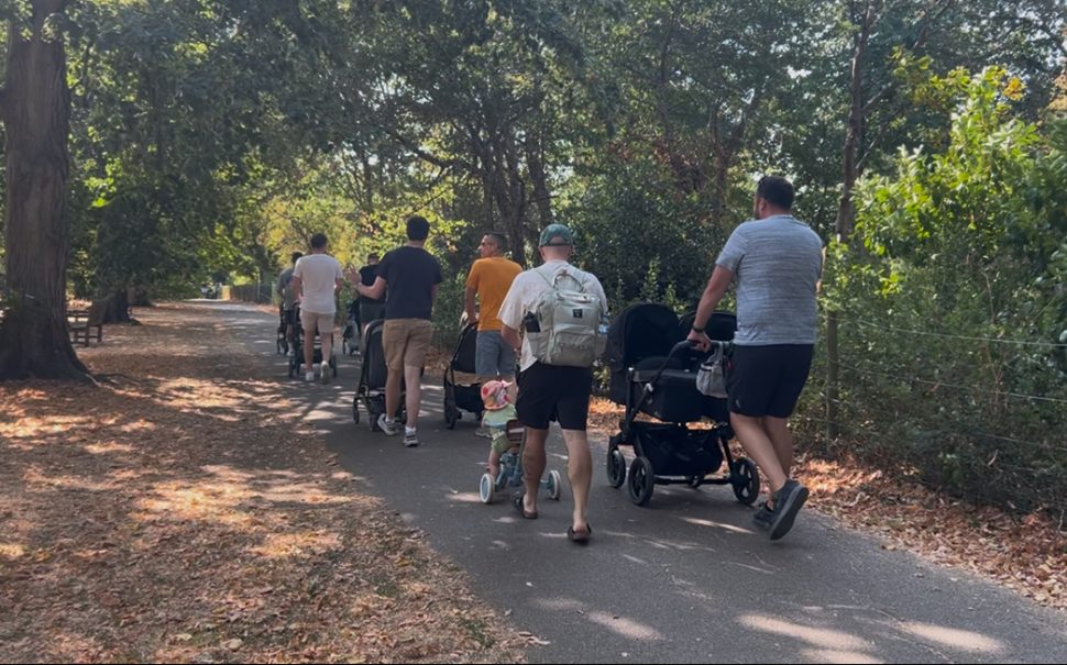 A support group for dads on a walk.