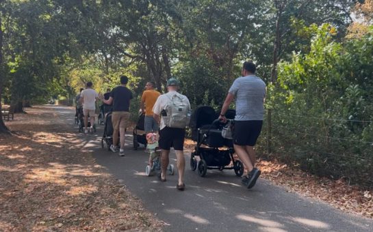 A support group for dads on a walk.