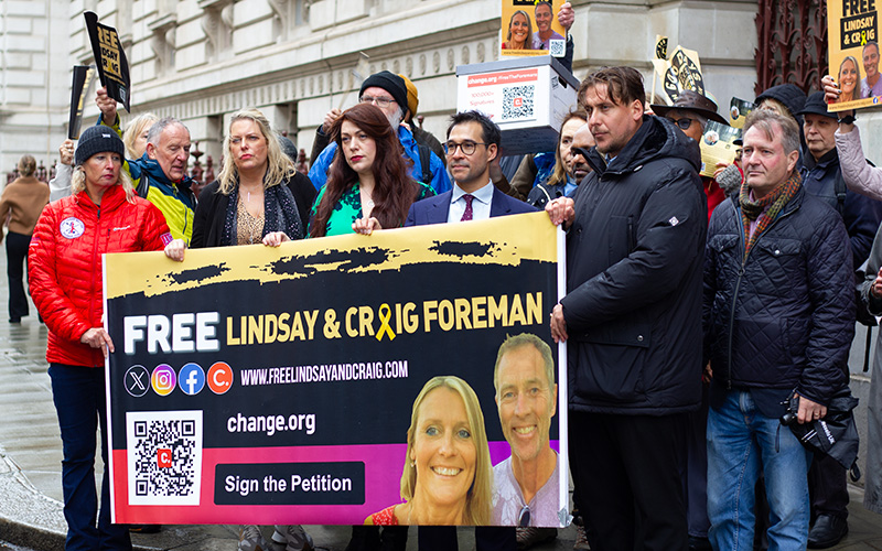 MPs Mims Davies, Alicia Kearns and Tony Vaughan hold a banner with Joe Bennett and various campaigners. Image credit: Keir Holmes.