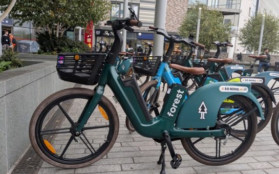 Forest bikes parked near London train station.