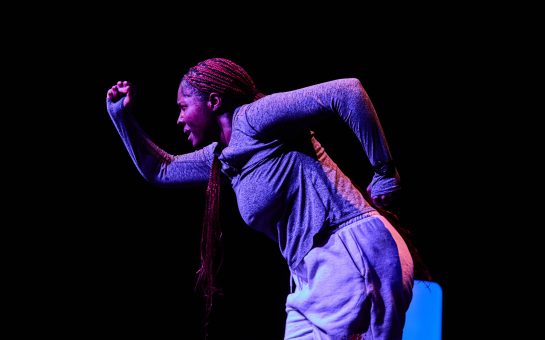 Lara Grace Ilori running as Anu in her play, Runner Girl