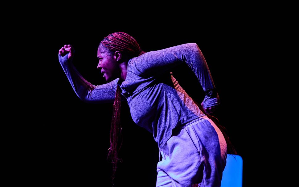 Lara Grace Ilori running as Anu in her play, Runner Girl