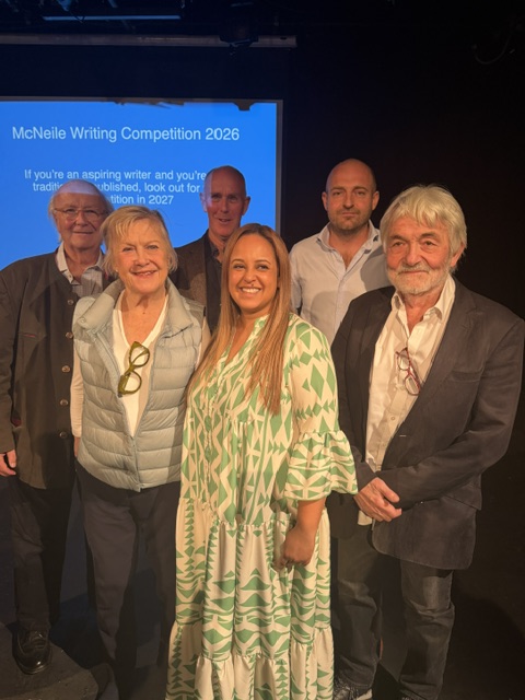 The writers and readers of this years writing competition pose for a photograph.
