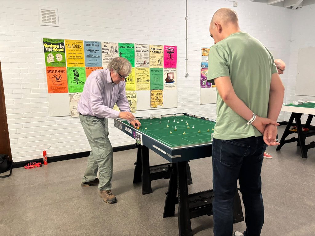 A match of Subbuteo in action.